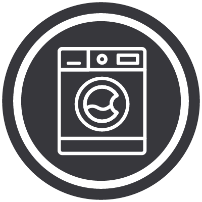 A white outline of a washing machine icon inside a dark circular background with a white ring border.