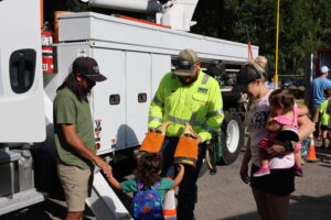 Family meets with NBU employee during Meet the Trucks